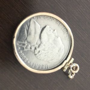 14k yellow gold bezel with 2004 nickel